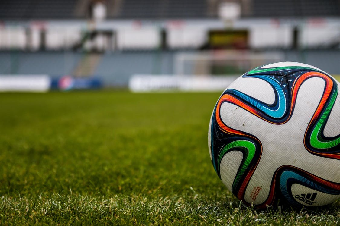 Picture of a soccer ball on the playing field