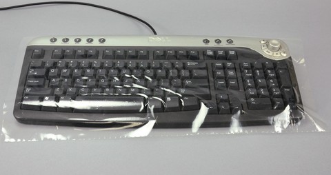 Disposable Clear Keyboard Protective Covers w/ Adhesive Backing 9` X 19`. Perforated roll. 