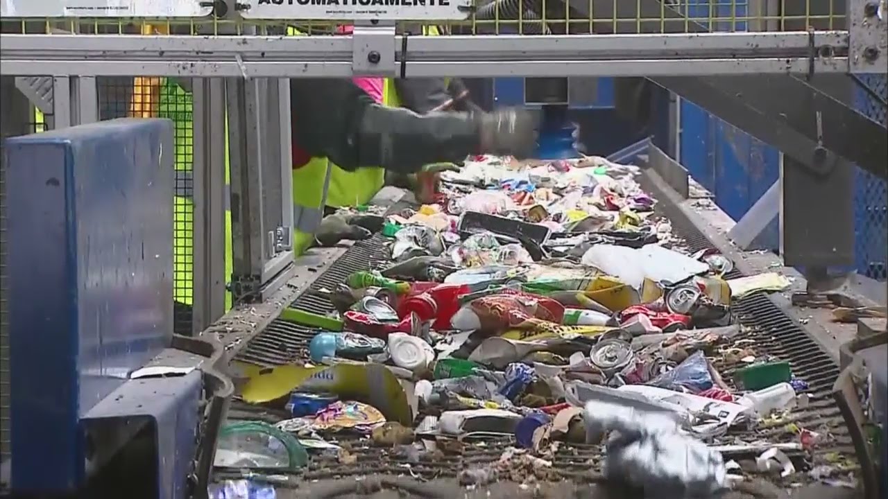 A refuse recycling line filled with trash