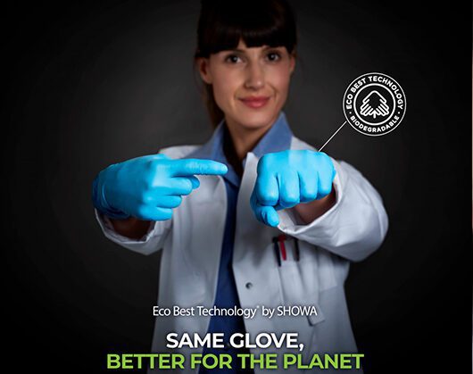 A worker wearing blue Showa EBT Nitrile Gloves
