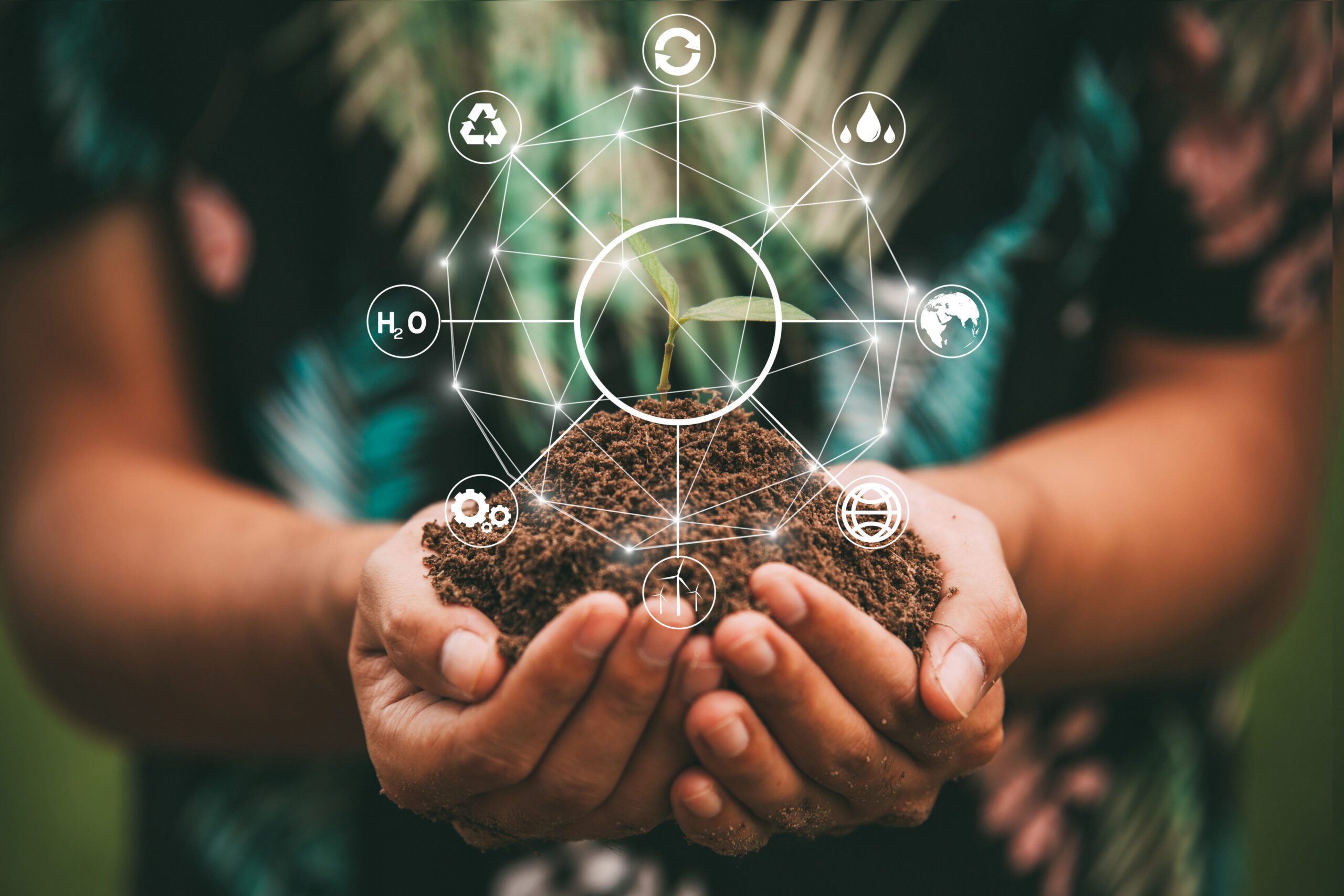 Eco Imageof Hand holding soil