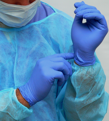 Tucking or adjusting the cuffs with dirty gloves can put one at great risk to infection and cross-contamination 