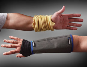 A pair of cut-resistant forearm guards support thermal industrial protectors 