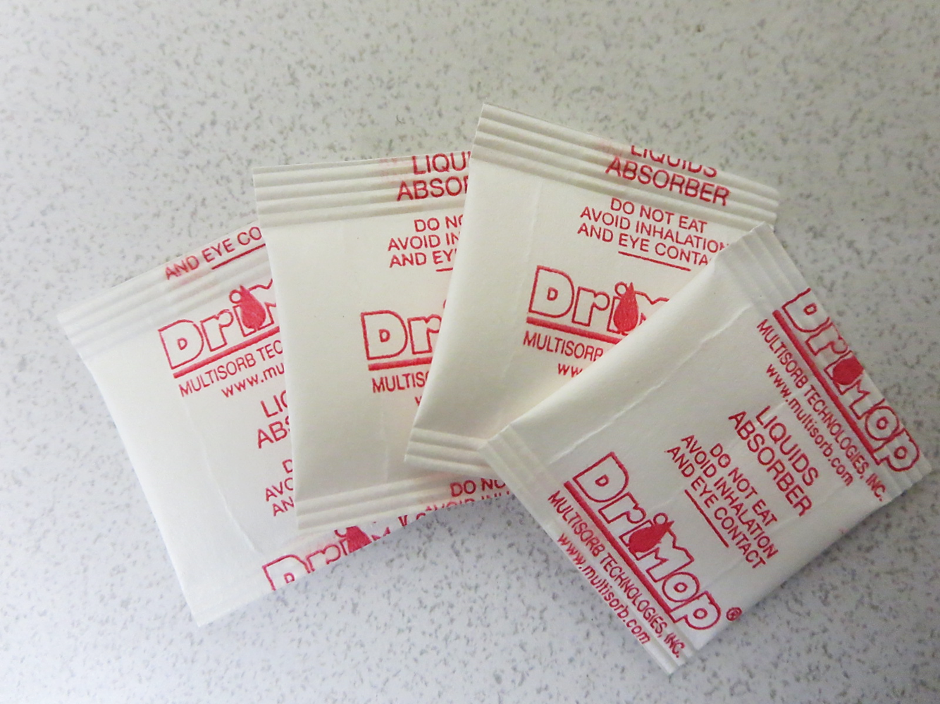 DriMop® Medical Liquid Solidifier Packets | Self Burting Liquid ...