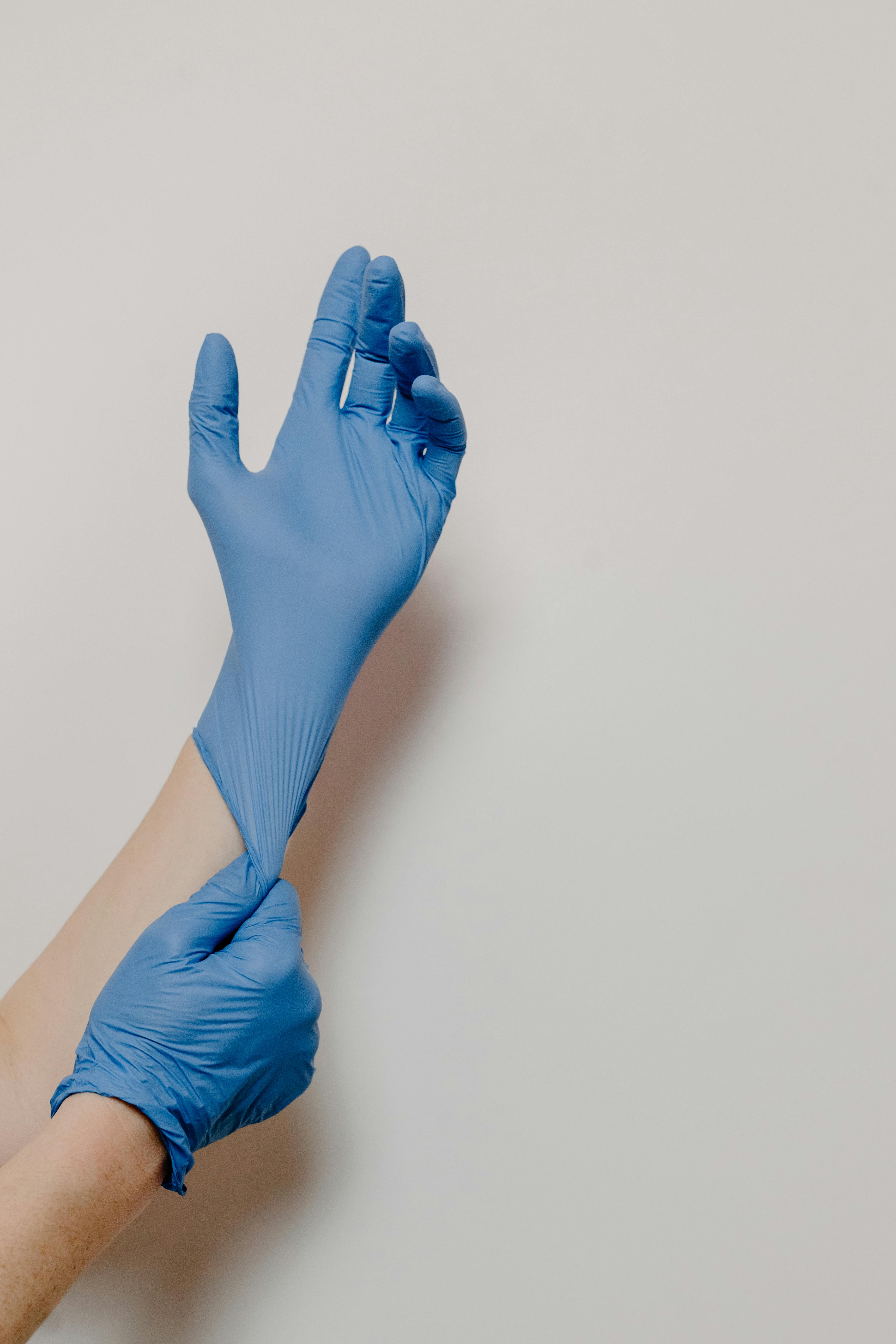 An Image of a Blue Nitrile Glove (Pexels - Tara Winstead)